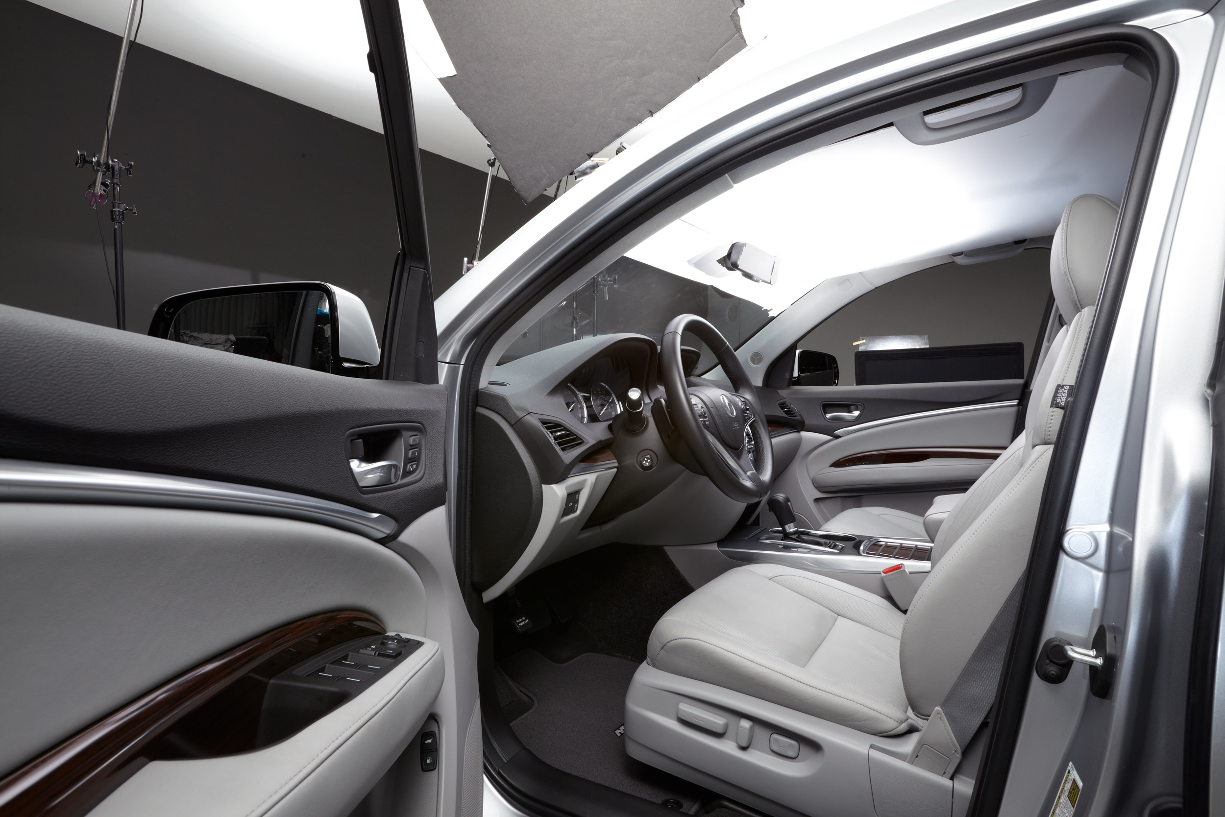 John Early High-End Digital Retouching - View Through Open Drivers Door of Acura MDX Shot In Studio